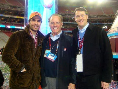 Eduardo Verastegui (Actor and Producer), Frank Gifford (NFL Legend and Commentator) and Sean Wolfington (Financier and Producer) on the field at Super Bowl XLII