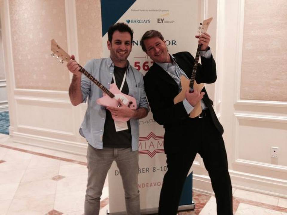 Rafael Atijas, left, founder and CEO of Loog Guitars of Uruguay, with Sean Wolfington, an Endeavor Miami board member. Atijas was selected as an Endeavor Entrepreneur on Wednesday.